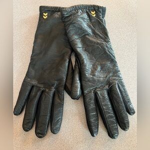 Authentic vintage Aris Isotoner leather gloves for ladies.